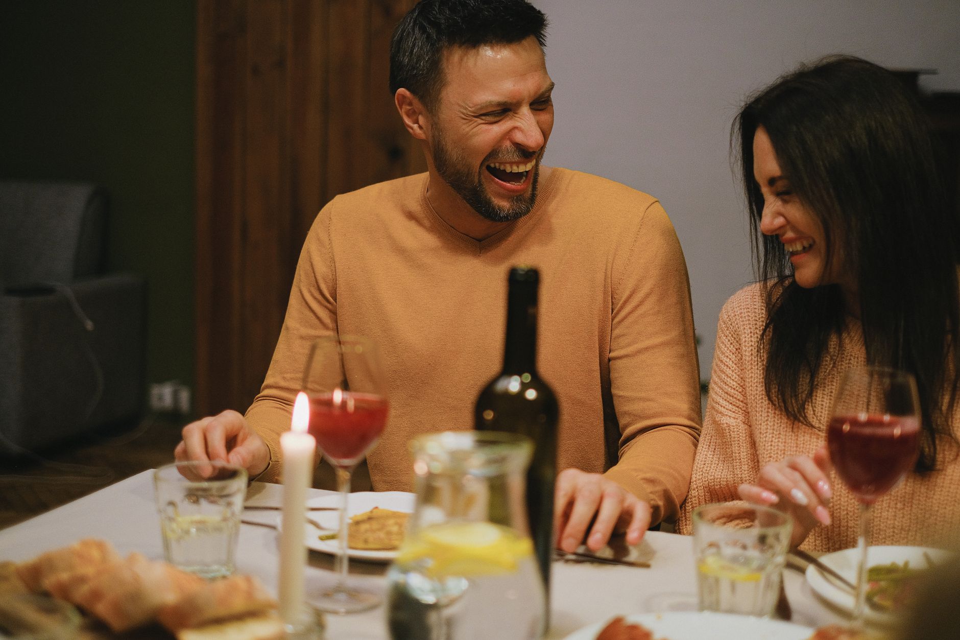 A couple in conversation at home