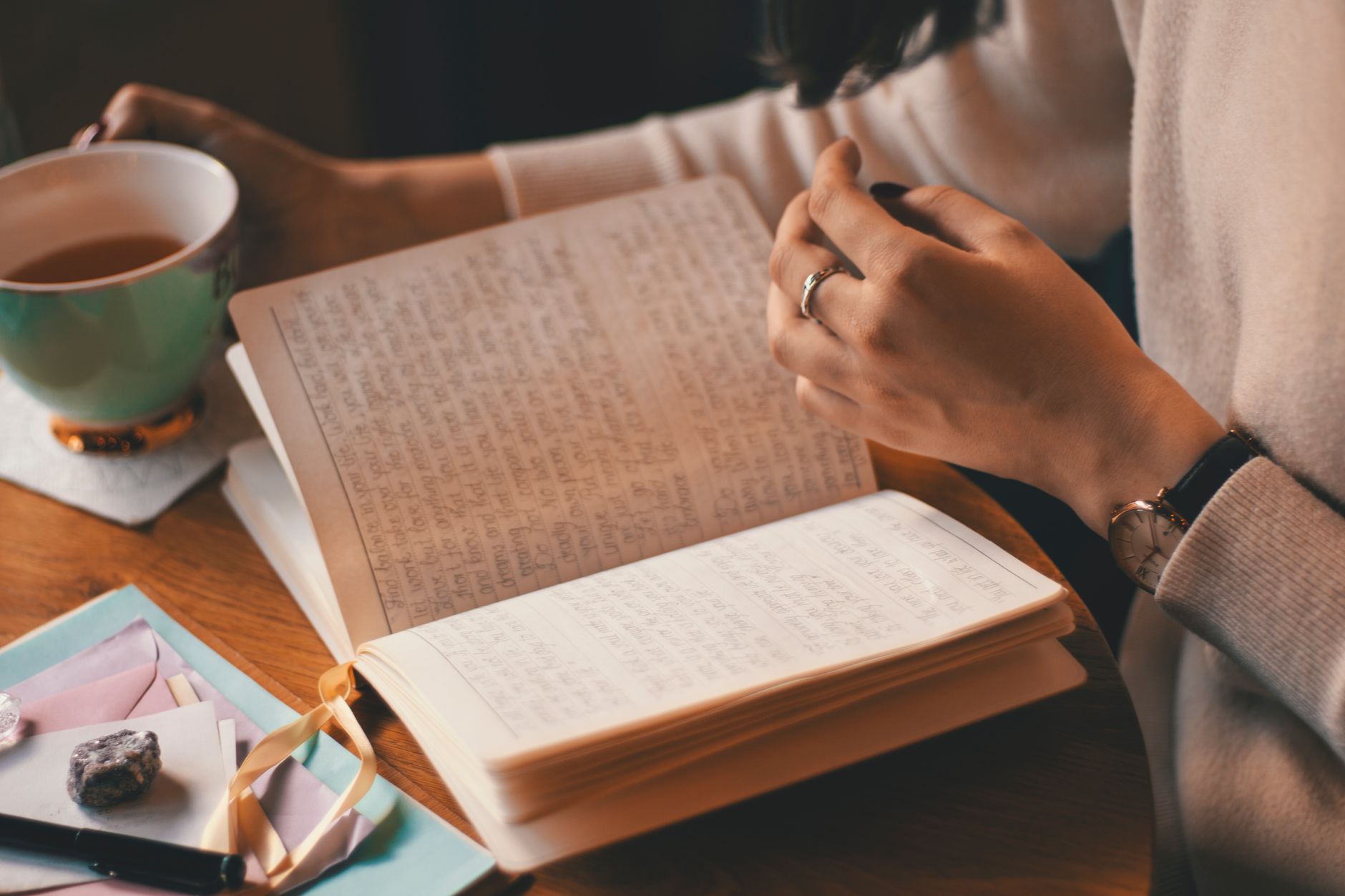 A person writing in a journal