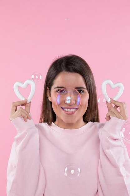 Which facial muscles contract when you see infantile features?